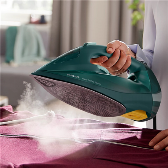 Philips | Iron | DST7050/70 | Steam Iron | 2800 W | Water tank capacity 300 ml | Continuous steam 50 g/min | Steam boost performance 250 g/min | Green