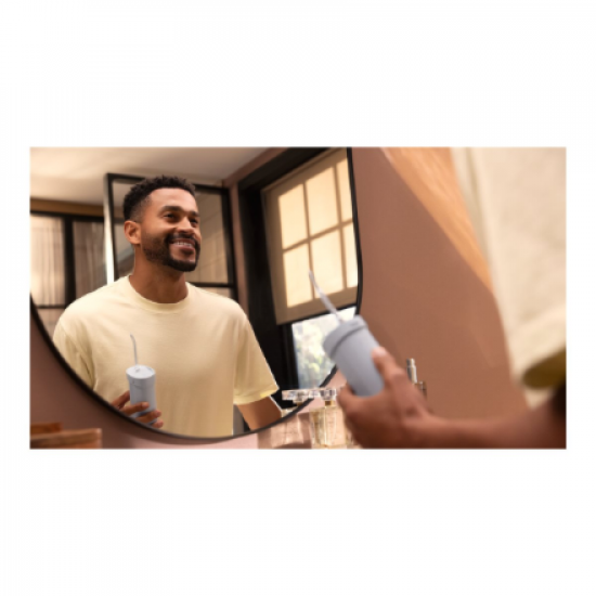 Philips Oral Irrigator | HX3333/24 Compact Flosser 1000 | 200 ml | Number of heads 1 | Blue